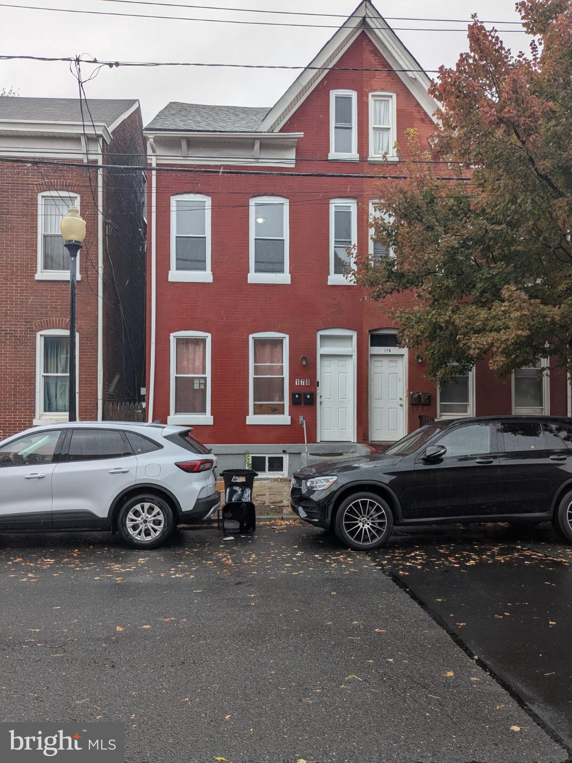 178 178-apt Hanover Street, Unit 2W Trenton, NJ 08618 - Photo 1 of 22 a car parked in front of a house