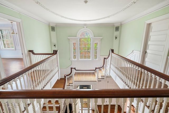 a view of an porch with wooden floor and windows