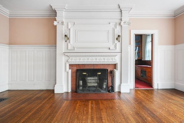 a living room with a fireplace