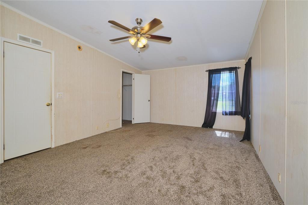 2701 Murphy Road Ona, FL 33865 - Photo 18 of 41 a view of an empty room and chandelier fan