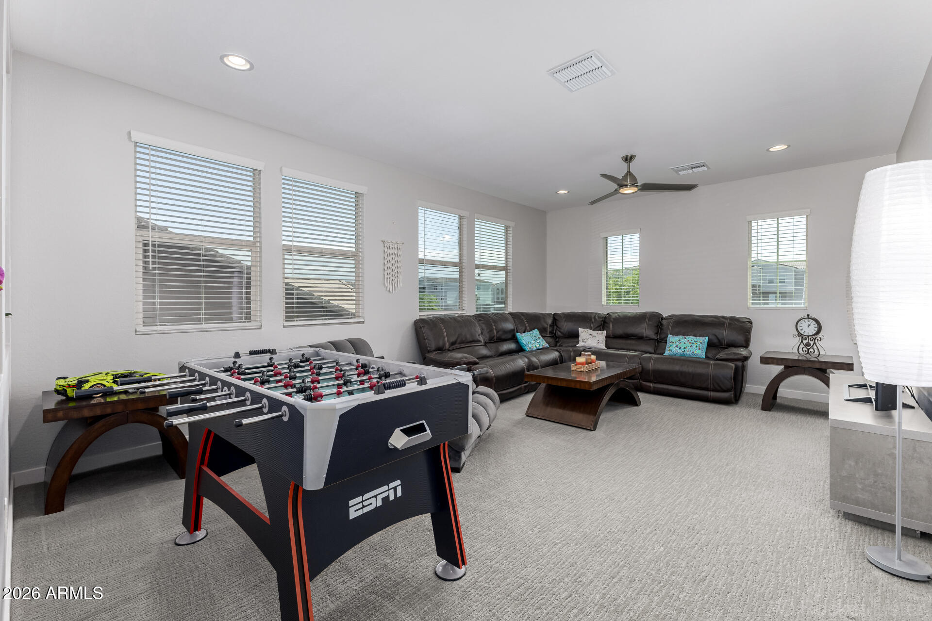 3494 East Spring Wheat Lane Gilbert, AZ 85296 - Photo 16 of 39 a bed room with furniture and a large window