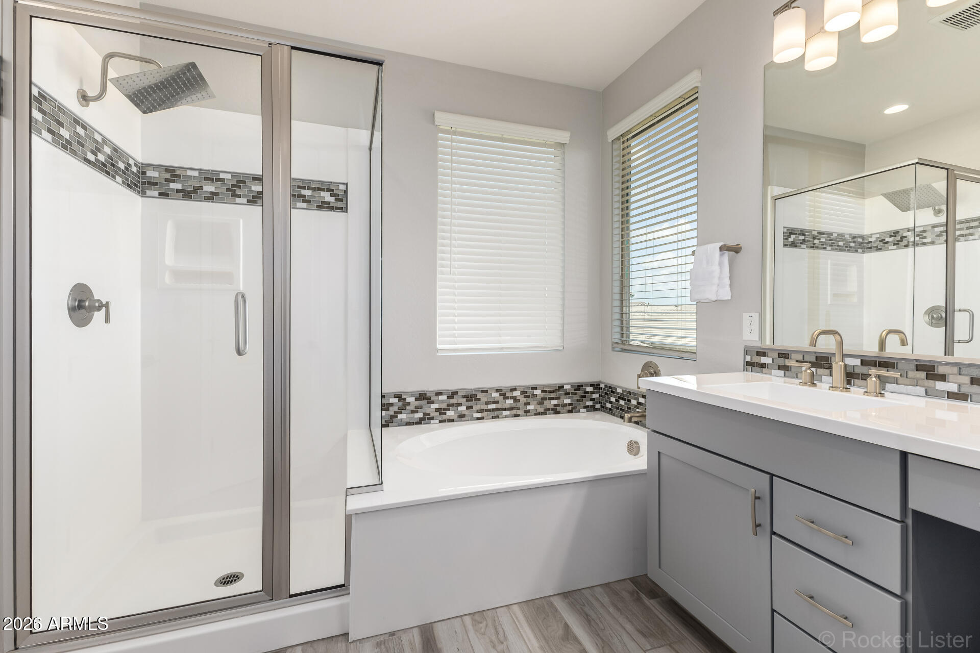 3494 East Spring Wheat Lane Gilbert, AZ 85296 - Photo 21 of 39 a bathroom with a tub sink and mirror