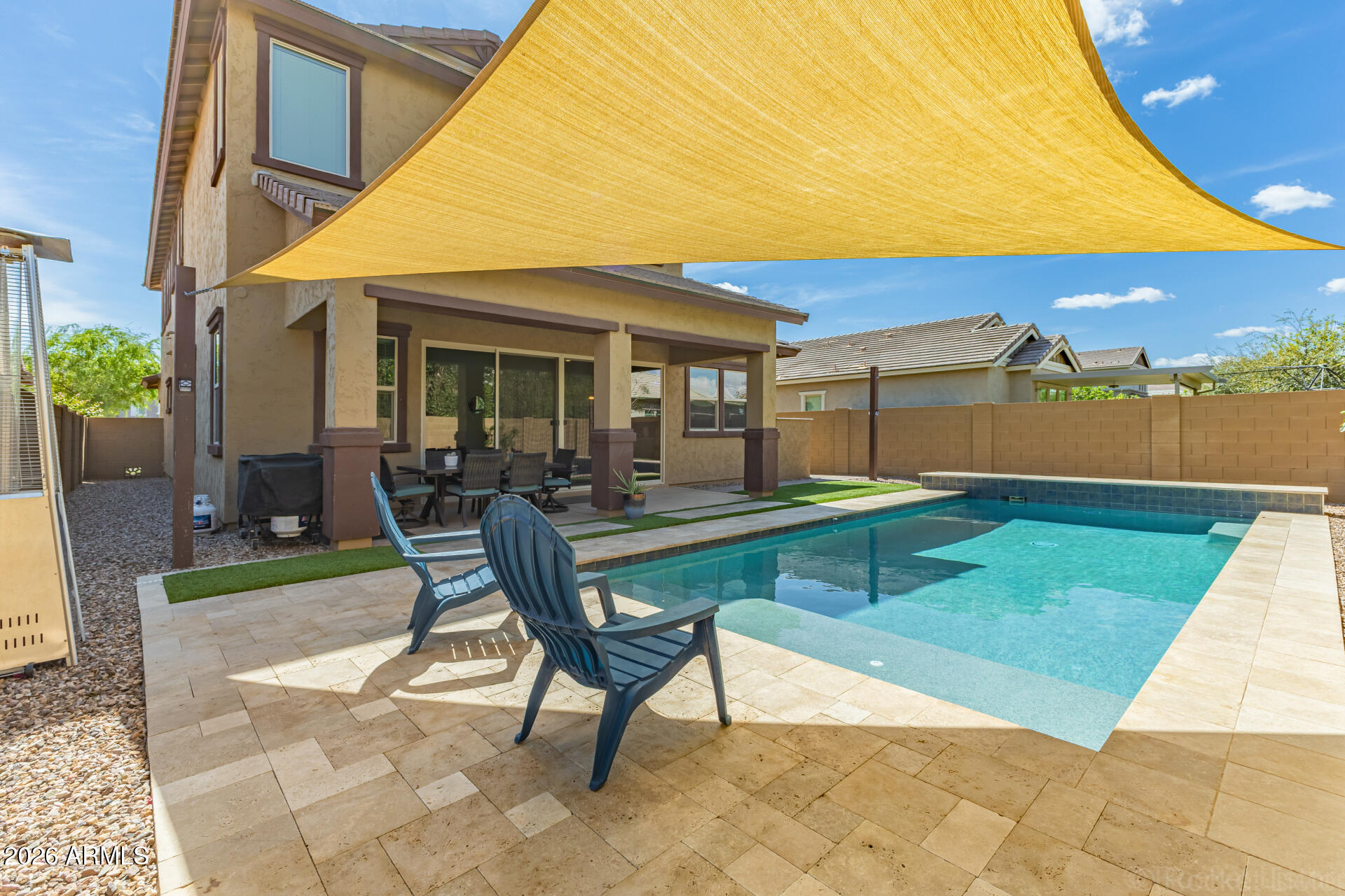 3494 East Spring Wheat Lane Gilbert, AZ 85296 - Photo 36 of 39 a view of a house with backyard porch and sitting area