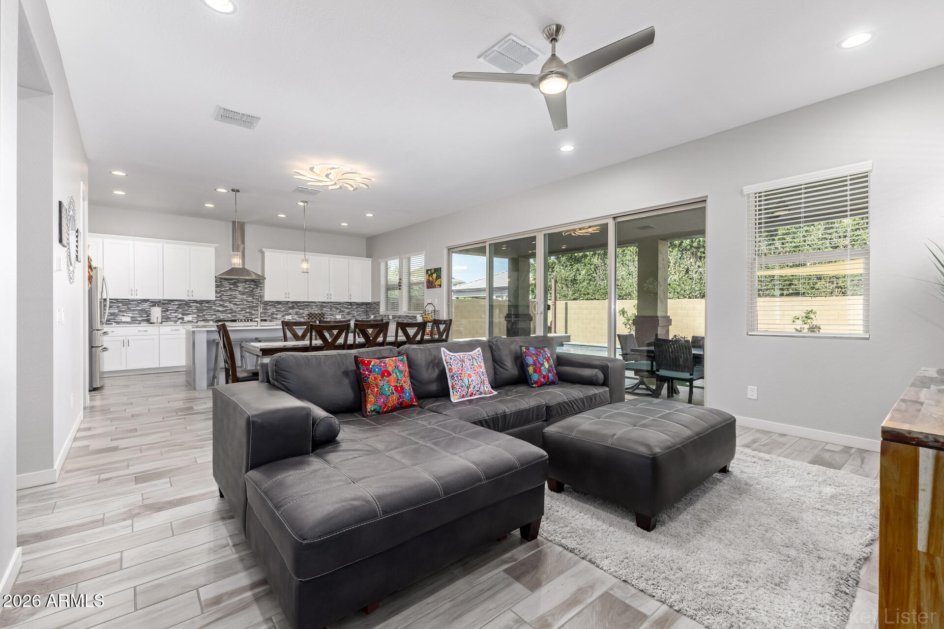3494 East Spring Wheat Lane Gilbert, AZ 85296 - Photo 9 of 39 a living room with furniture and a large window