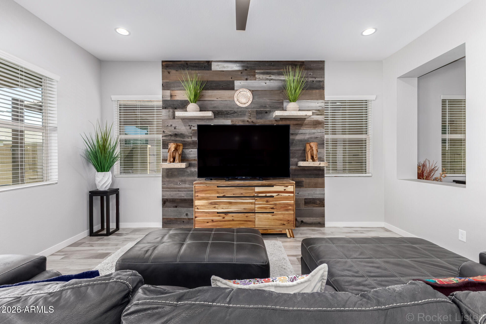 3494 East Spring Wheat Lane Gilbert, AZ 85296 - Photo 10 of 39 a living room with furniture and a fireplace