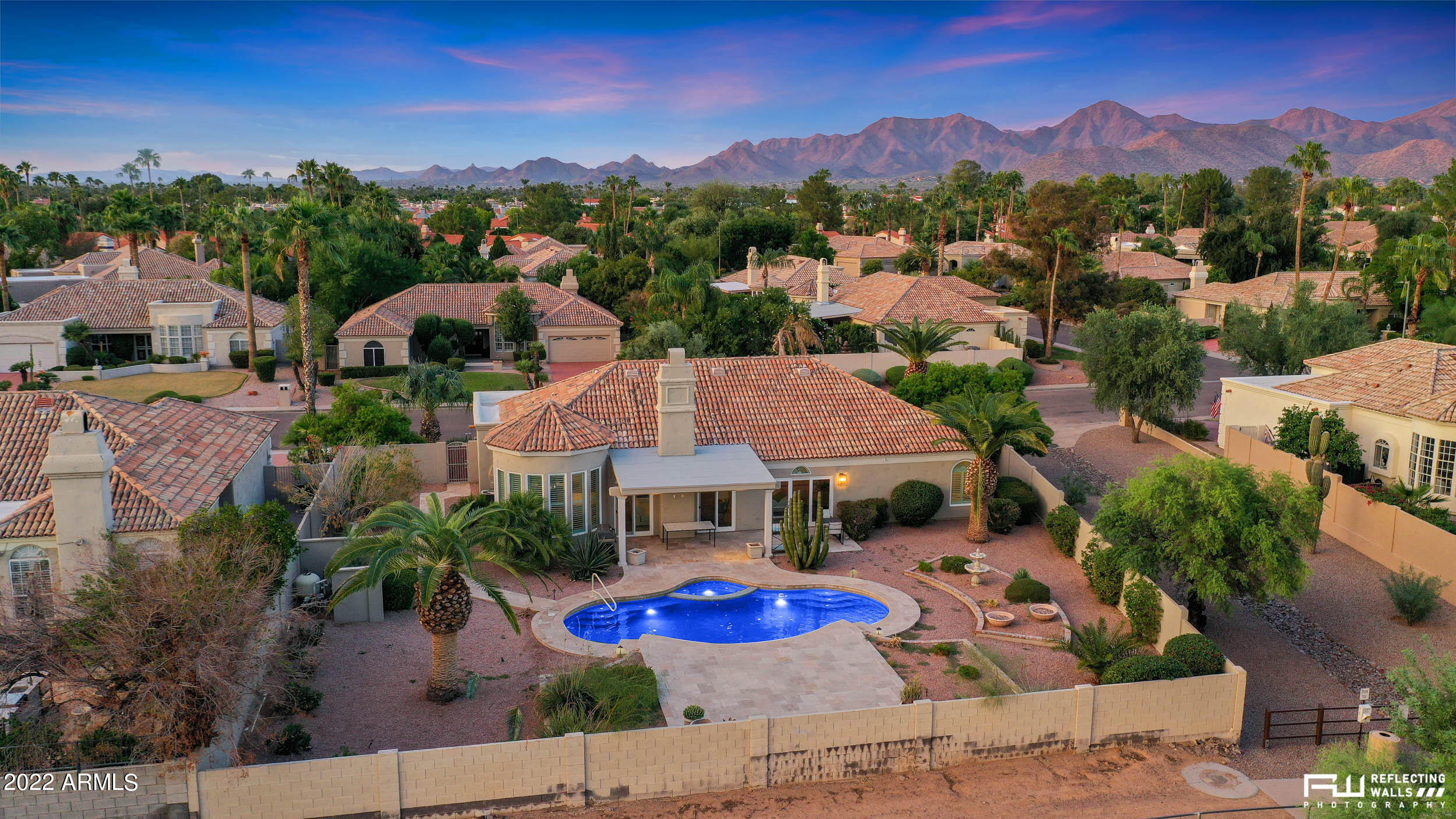 10085 East Doubletree Ranch Road Scottsdale, AZ 85258 - Photo 58 of 62 an aerial view of a house with garden space and mountain view