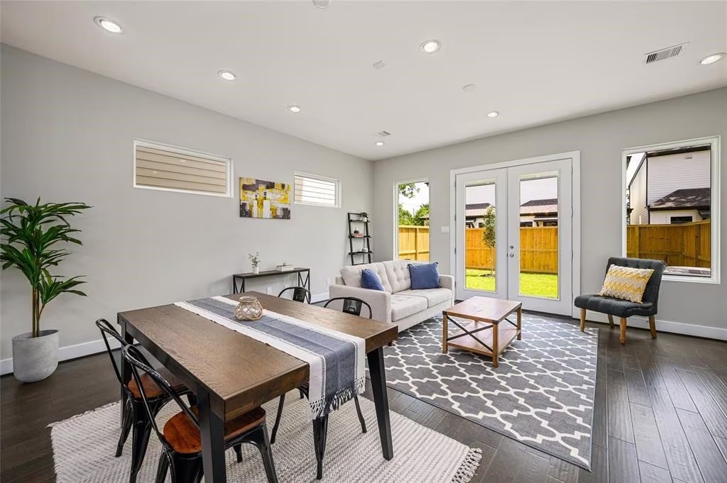 105 West Whitney Street, Unit B Houston, TX 77018 - Photo 9 of 11 a living room with furniture and wooden floor
