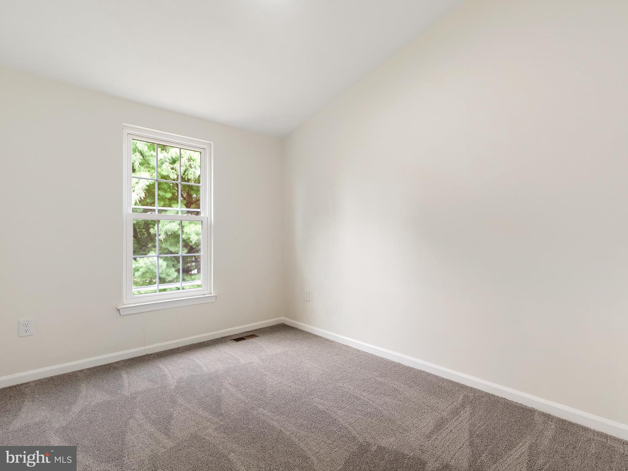 4226 Red Haven Road Baltimore, MD 21208 - Photo 13 of 32 an empty room with a window
