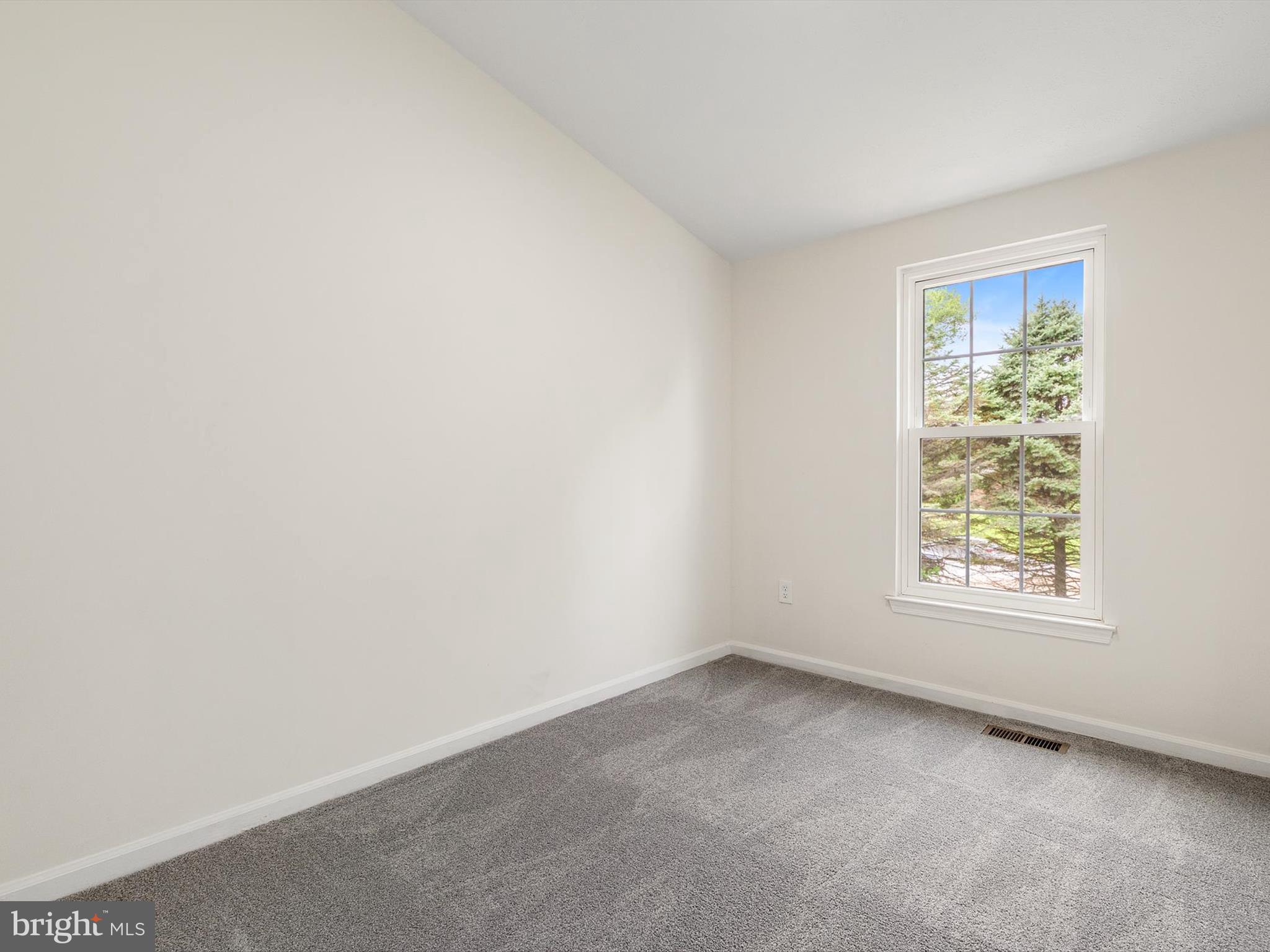 4226 Red Haven Road Baltimore, MD 21208 - Photo 15 of 32 an empty room with a window