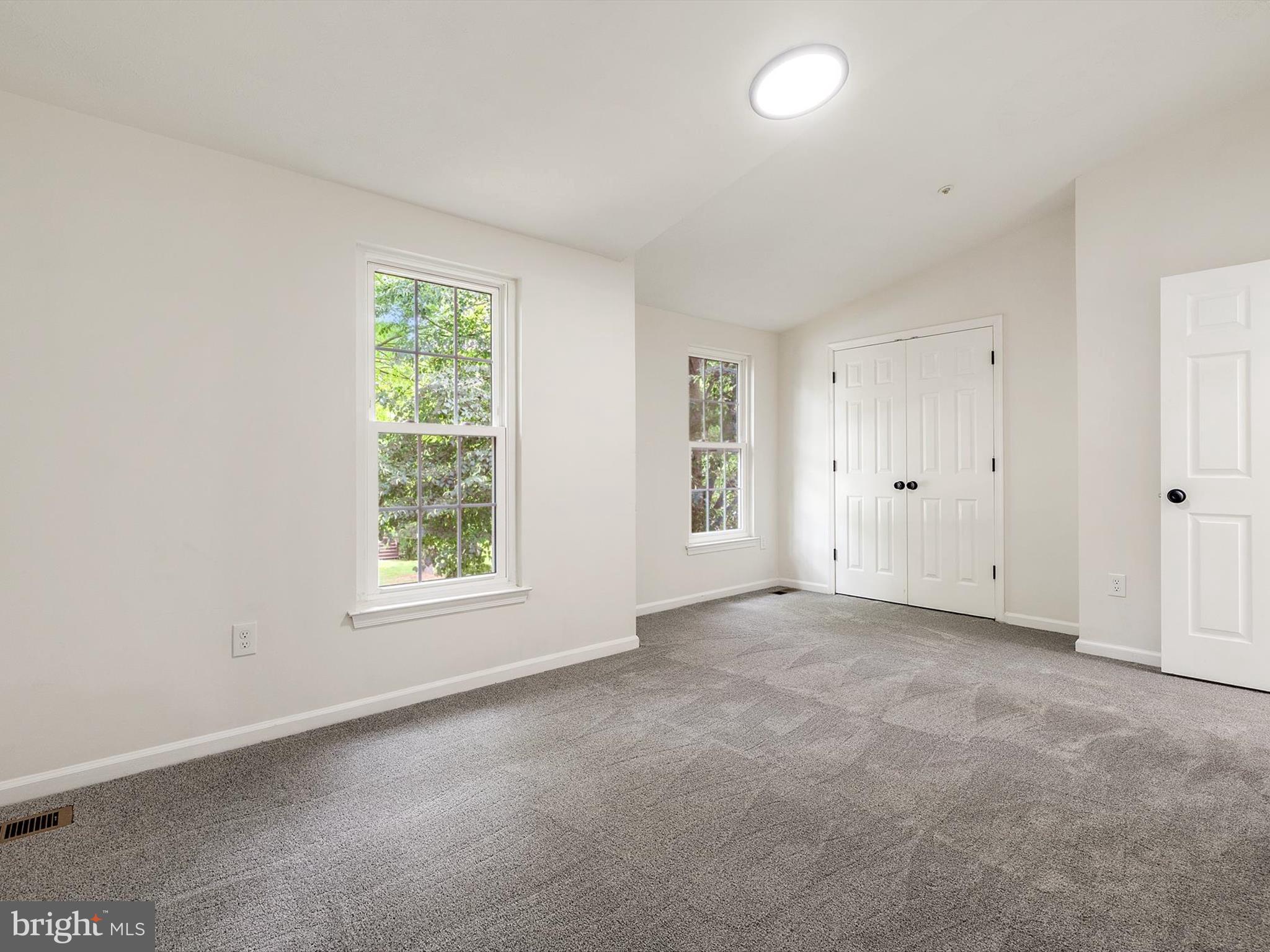 4226 Red Haven Road Baltimore, MD 21208 - Photo 18 of 32 an empty room with windows