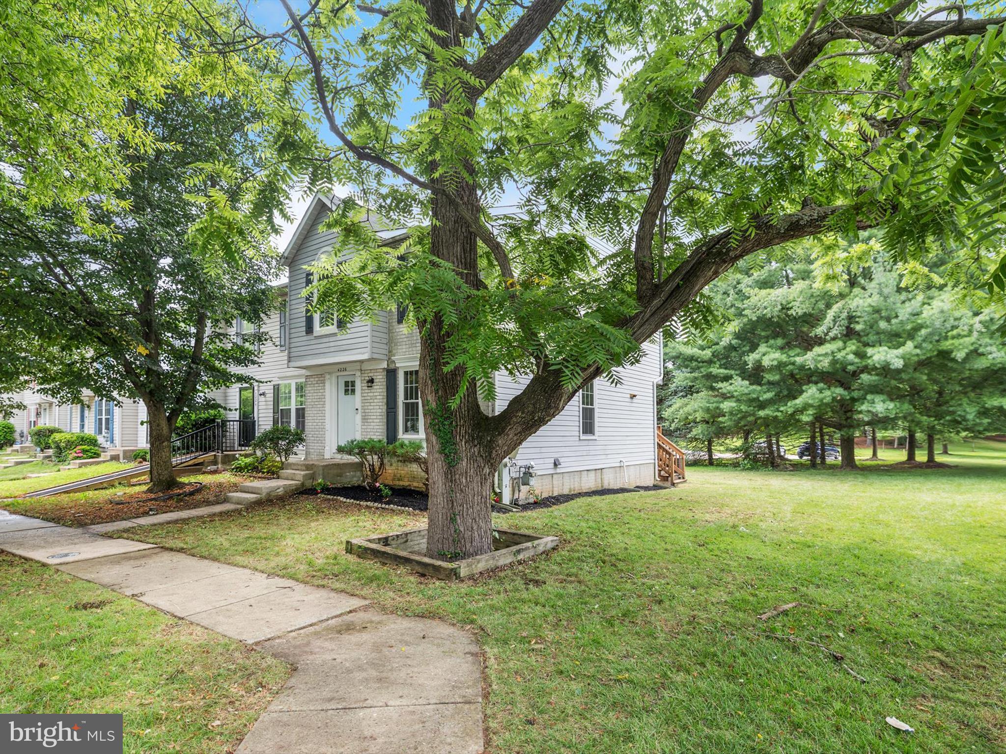 4226 Red Haven Road Baltimore, MD 21208 - Photo 27 of 32 a view of a house with a yard and tree s