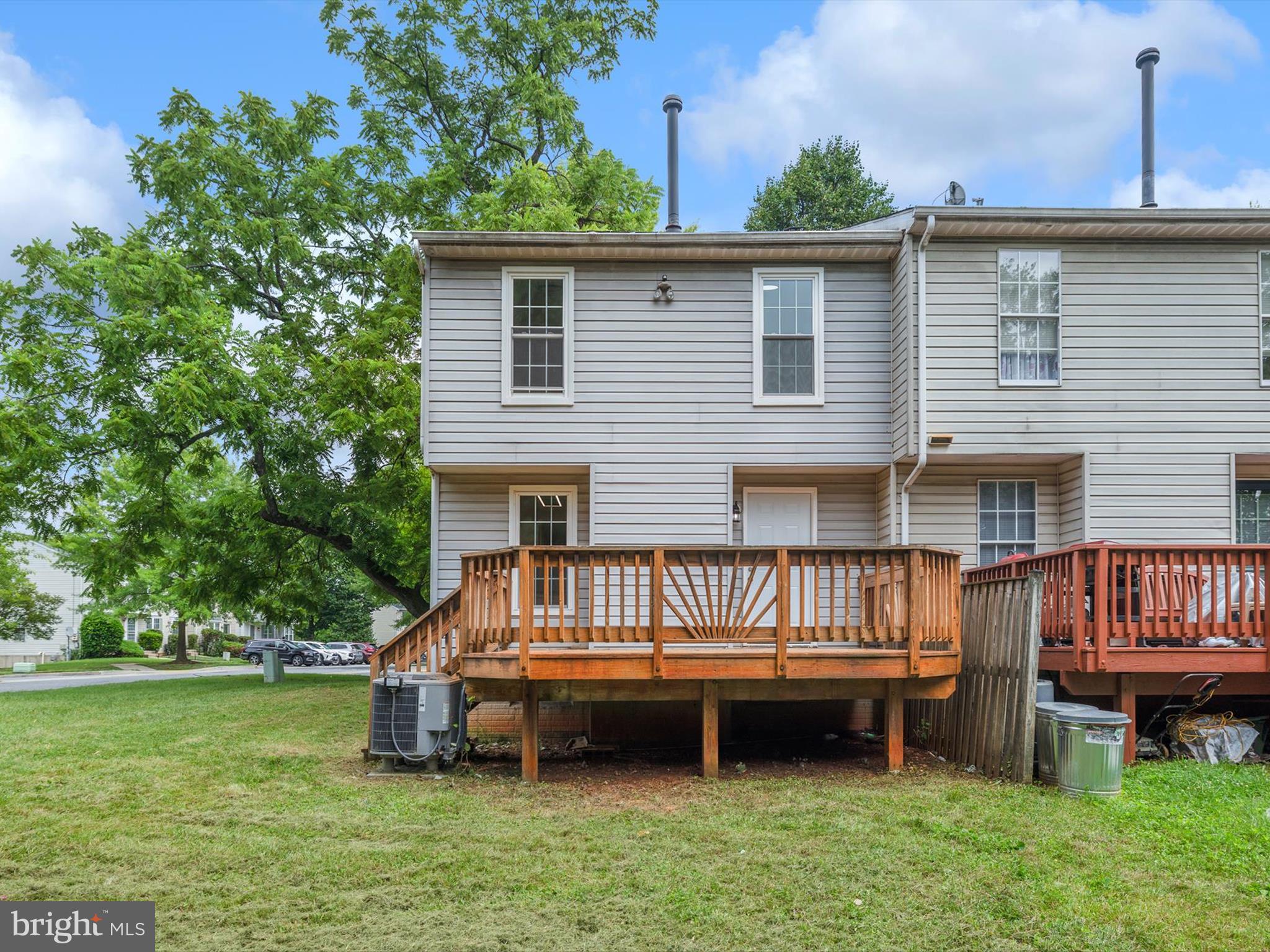 4226 Red Haven Road Baltimore, MD 21208 - Photo 28 of 32 a view of a house with a yard and deck