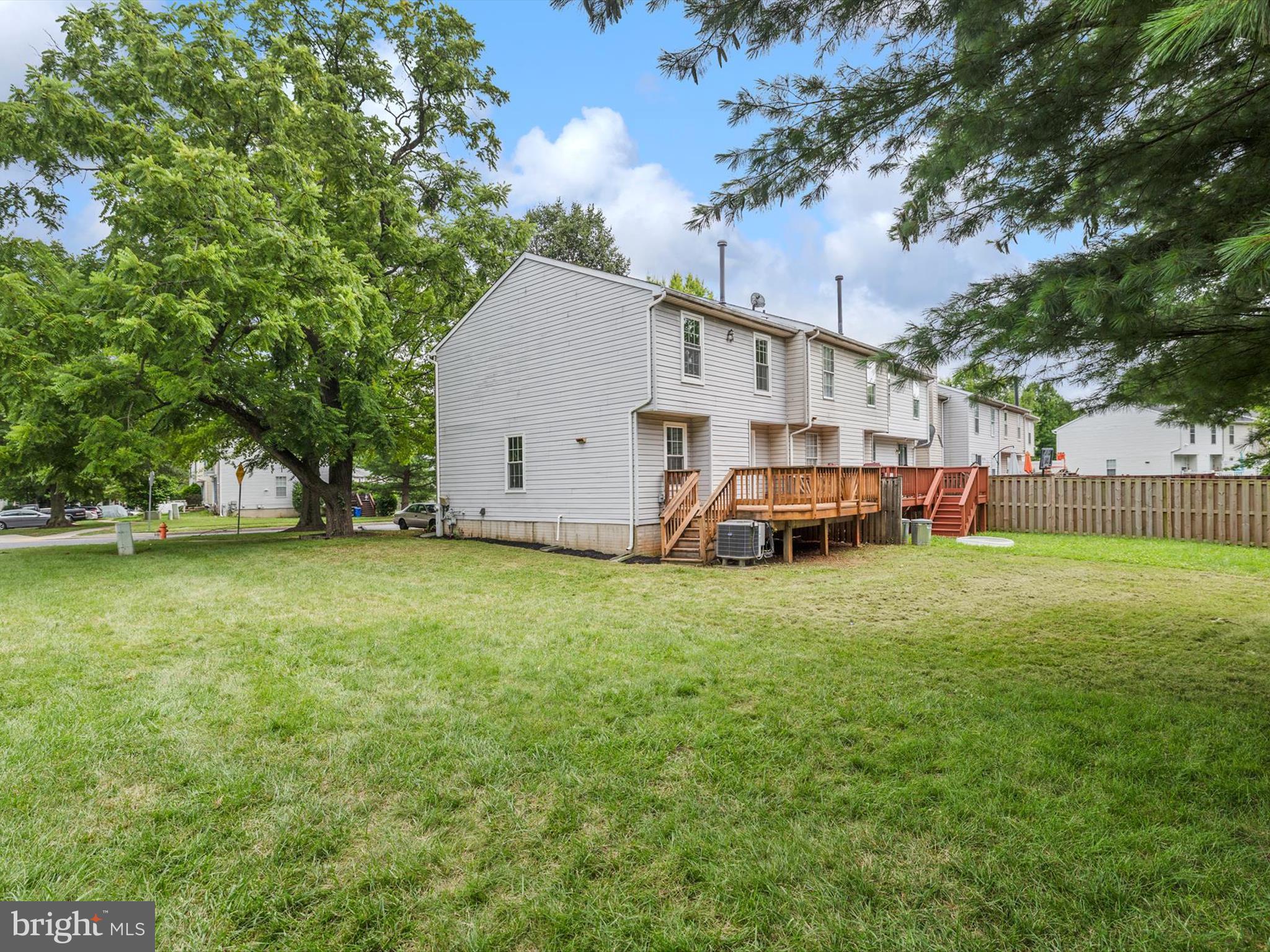 4226 Red Haven Road Baltimore, MD 21208 - Photo 32 of 32 a front view of house with yard and trees