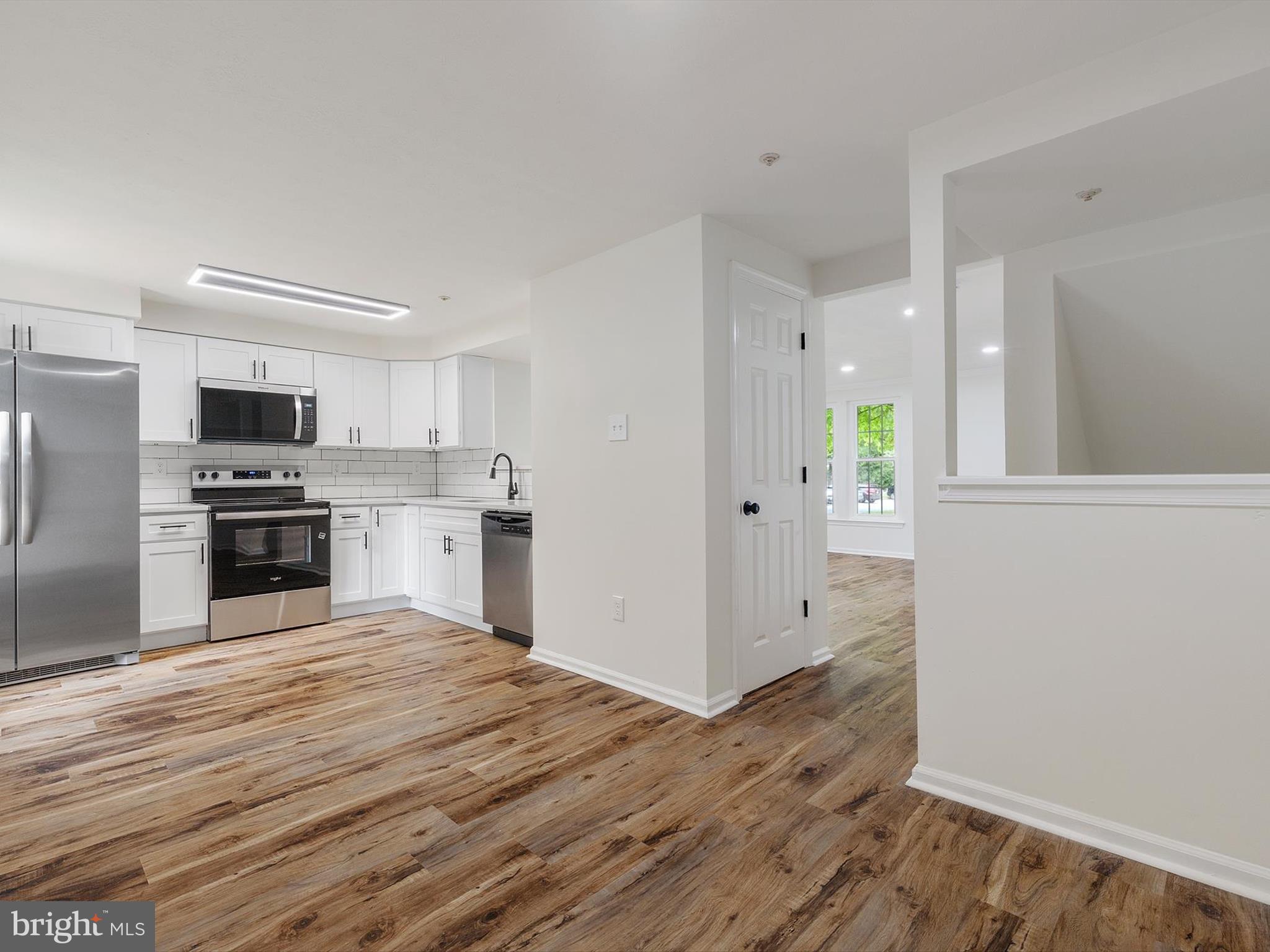 4226 Red Haven Road Baltimore, MD 21208 - Photo 4 of 32 a view of kitchen with wooden floor