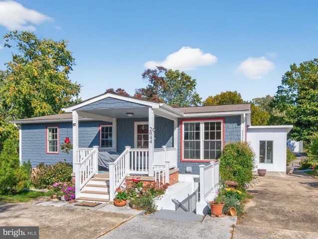 front view of a house with a small yard
