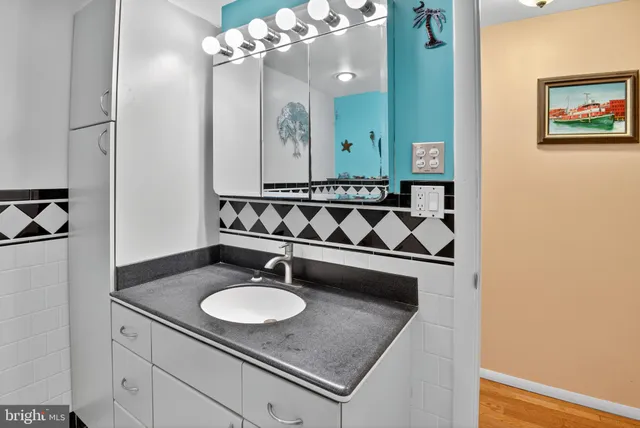 a view of workspace with wooden floor windows