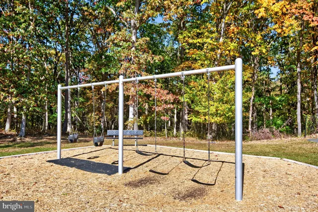 a view of a yard with an outdoor seating