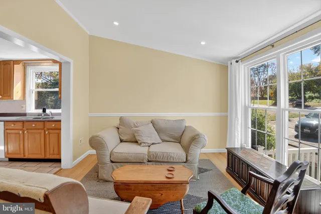a living room with furniture and a area