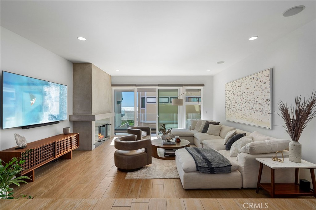 73 B Surfside Surfside, CA 90743 - Photo 11 of 40 2nd floor large living area with beautiful ocean views and slider to patio