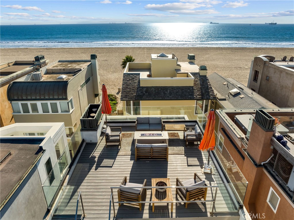 73 B Surfside Surfside, CA 90743 - Photo 2 of 40 Elevated rooftop deck to maximize ocean views