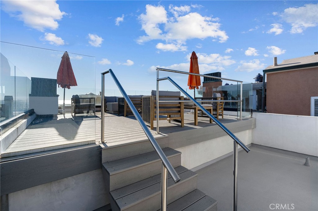 73 B Surfside Surfside, CA 90743 - Photo 29 of 40 rooftop deck over entire home, elevated on ocean side