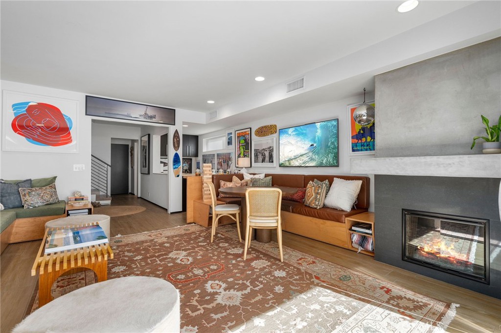 73 B Surfside Surfside, CA 90743 - Photo 5 of 40 1st floor large family room area with custom built in seating