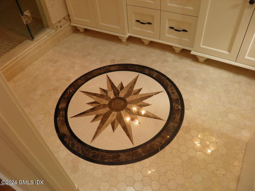 1 Field Road Cos Cob, CT 06807 - Photo 16 of 22 a view of a livingroom with wooden floor and entryway