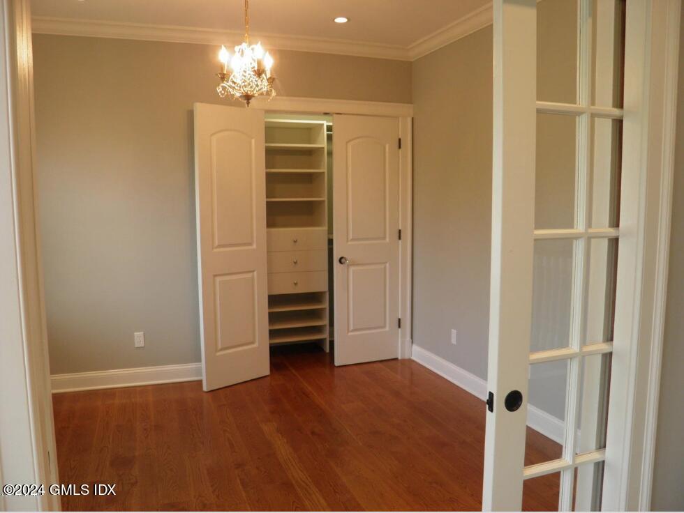 1 Field Road Cos Cob, CT 06807 - Photo 17 of 22 a view of a livingroom with a chandelier