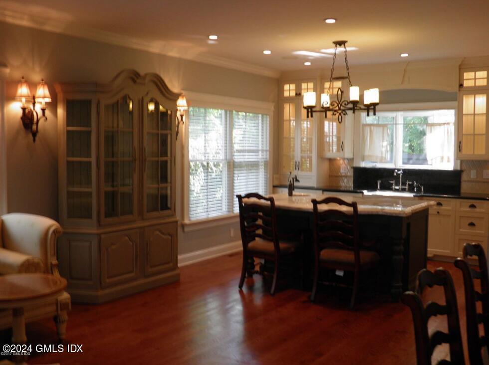 1 Field Road Cos Cob, CT 06807 - Photo 3 of 22 a view of a dining room with furniture window and wooden floor