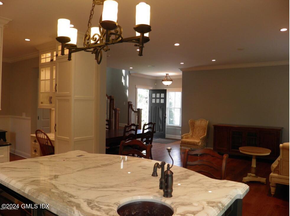 1 Field Road Cos Cob, CT 06807 - Photo 5 of 22 a dining room with furniture and wooden floor