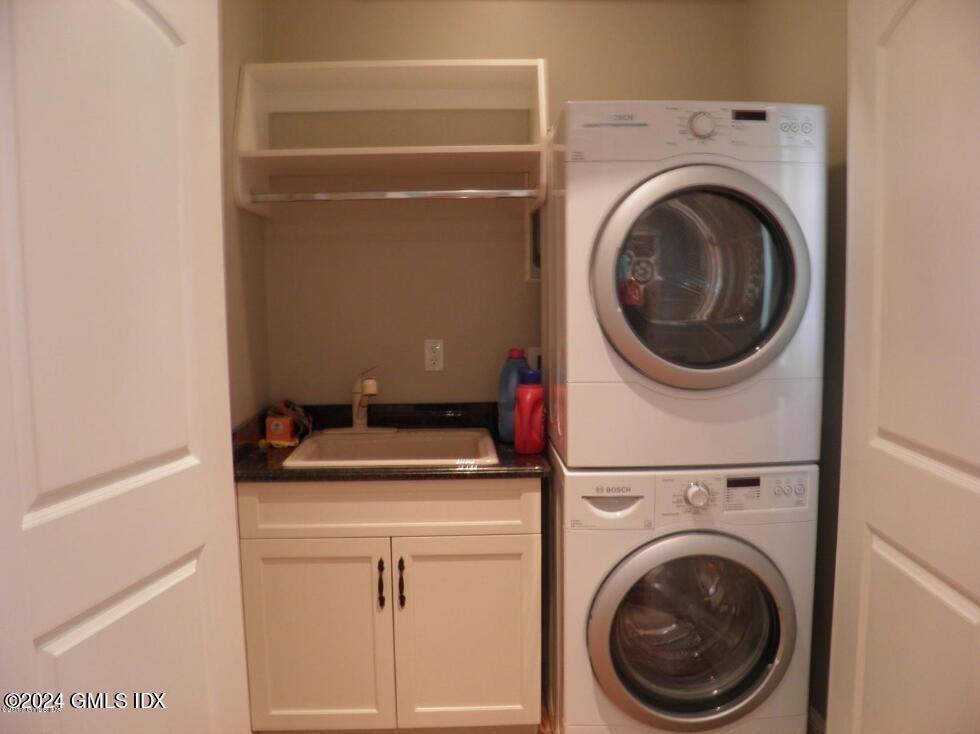 1 Field Road Cos Cob, CT 06807 - Photo 10 of 22 a utility room with dryer and washer