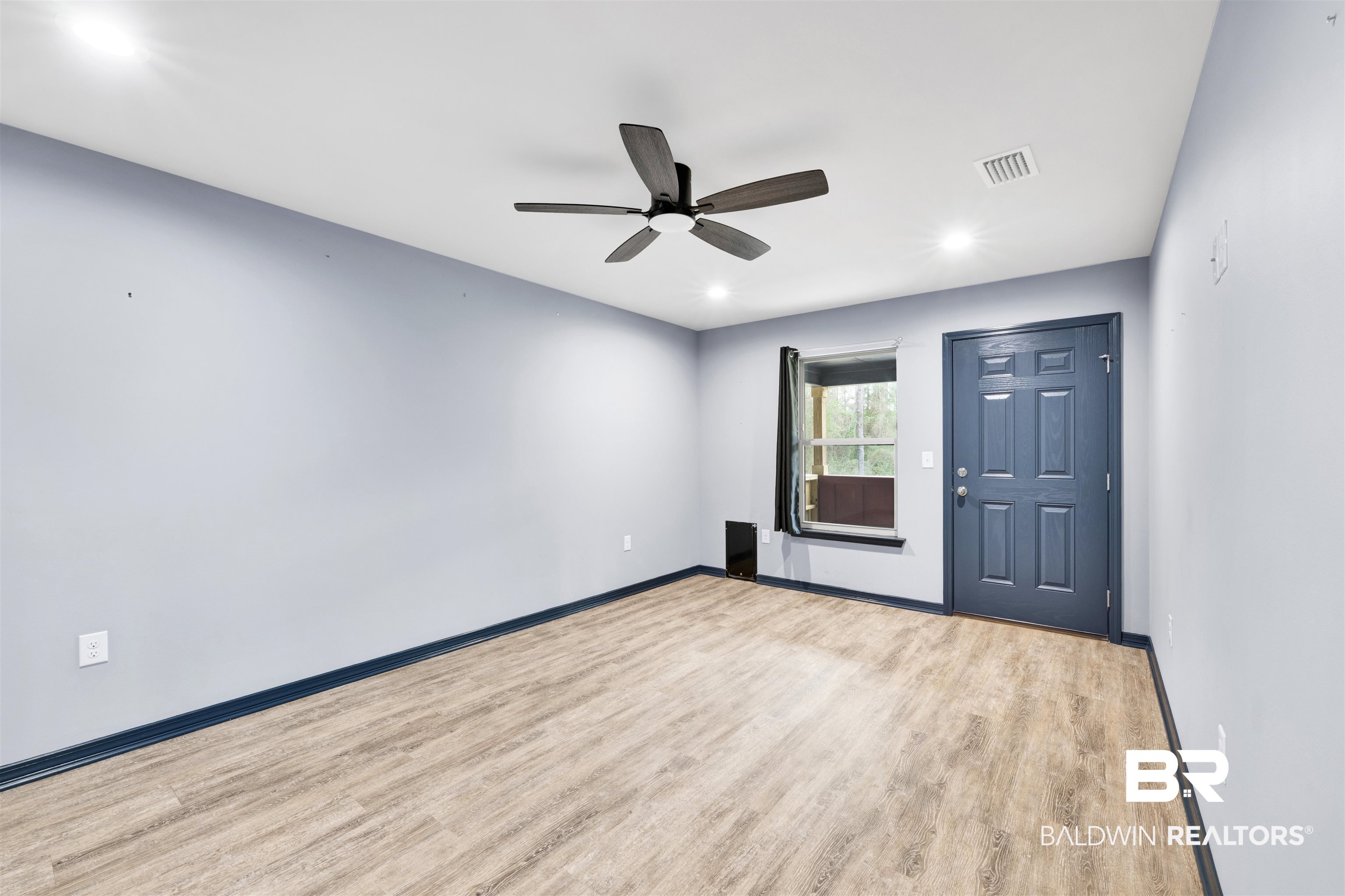 36397 Alexandria Trail Stapleton, AL 36578 - Photo 49 of 65 Empty room featuring light wood-style flooring, a ceiling fan, and recessed lighting