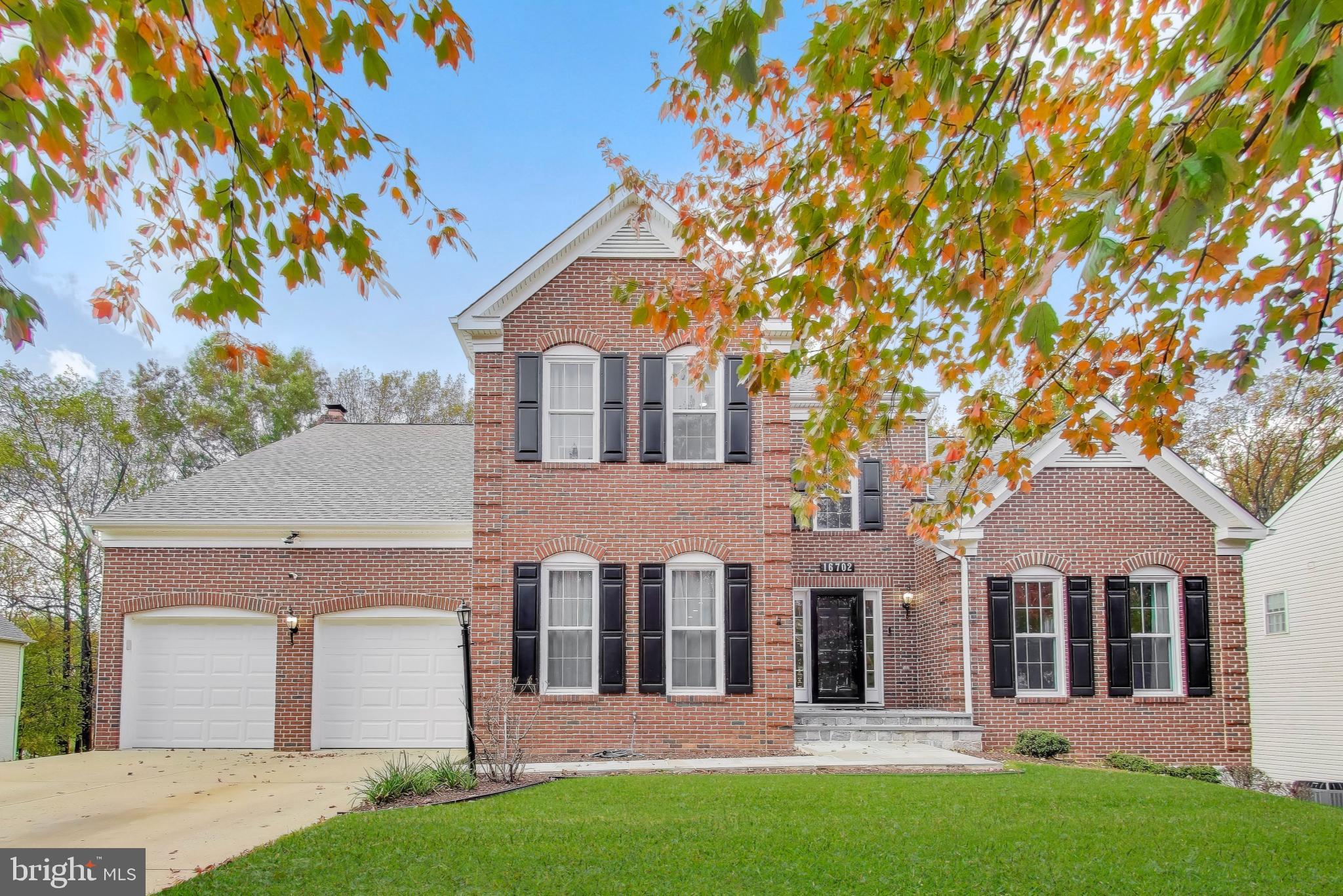 16702 Gooseneck Terrace Olney, MD 20832 - Photo 1 of 65 front view of a house with a yard