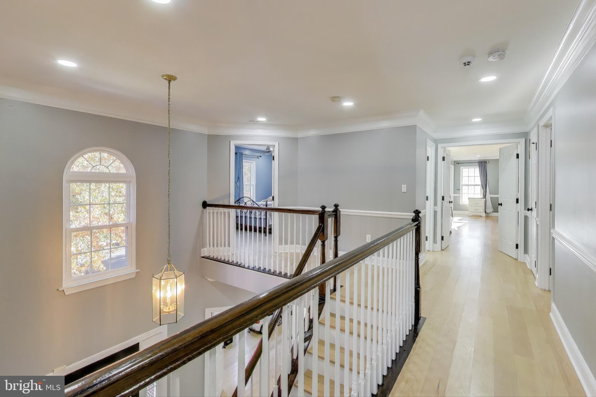 16702 Gooseneck Terrace Olney, MD 20832 - Photo 25 of 65 a view of an entryway with wooden floor
