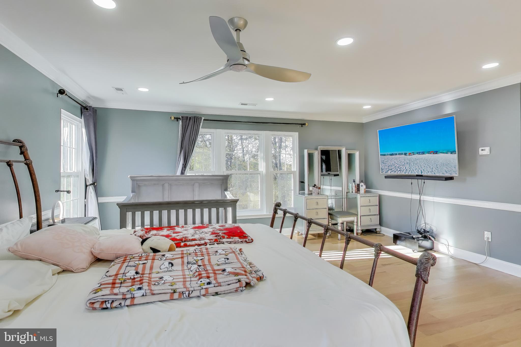 16702 Gooseneck Terrace Olney, MD 20832 - Photo 28 of 65 a bedroom with furniture and a large window