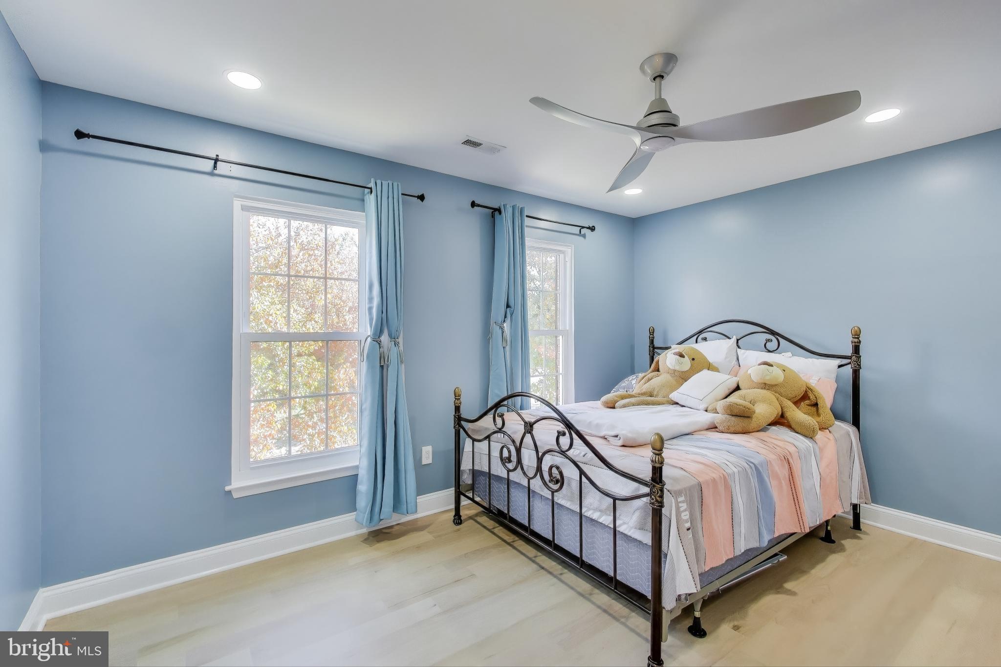 16702 Gooseneck Terrace Olney, MD 20832 - Photo 36 of 65 a bedroom with a bed and window