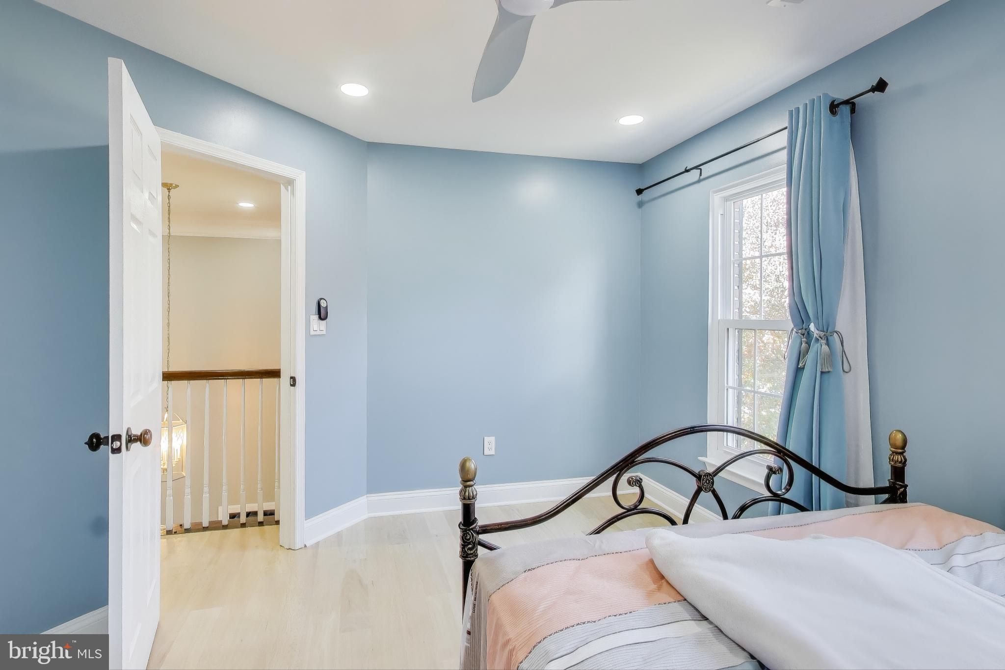 16702 Gooseneck Terrace Olney, MD 20832 - Photo 37 of 65 a bedroom with a bed and a window