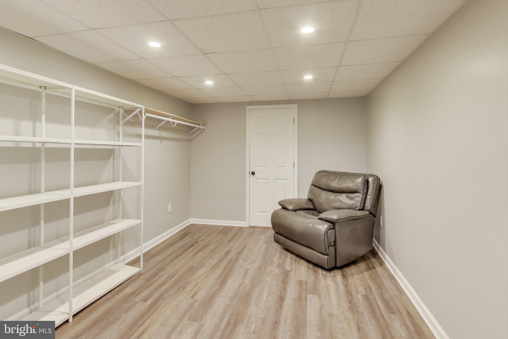 16702 Gooseneck Terrace Olney, MD 20832 - Photo 46 of 65 a living room with a couch and a rug
