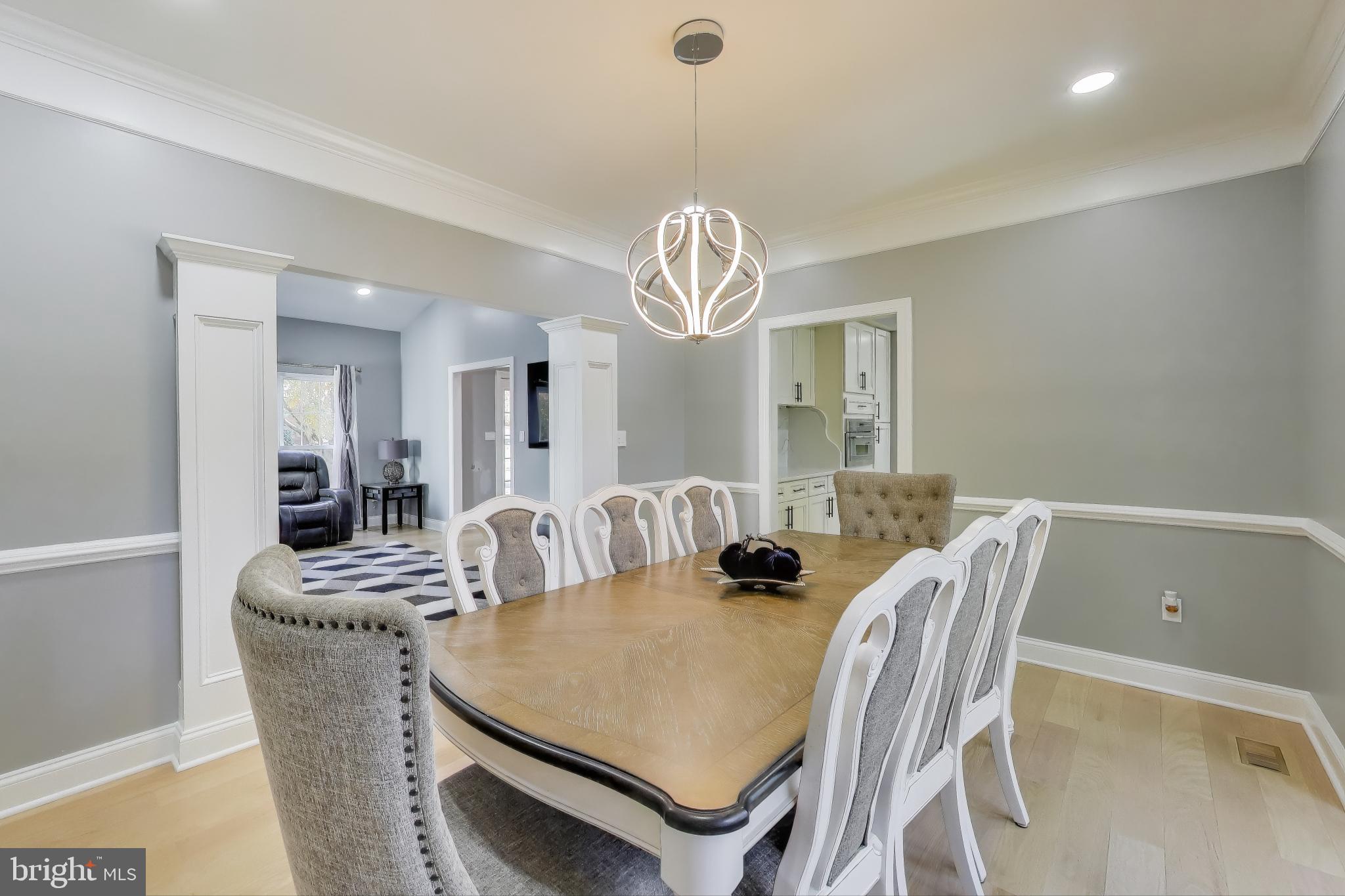 16702 Gooseneck Terrace Olney, MD 20832 - Photo 10 of 65 a view of a dining room with furniture