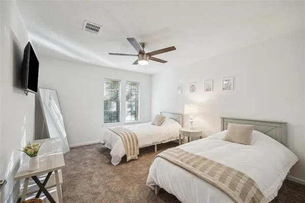 $7,000 | 89 Towering Pines Drive, The Woodlands, TX 77381