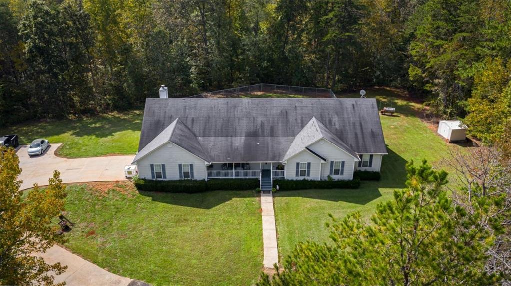 1427 Williams Bridge Road Toccoa, GA 30577 - Photo 1 of 1 a view of a house with a big yard and large trees