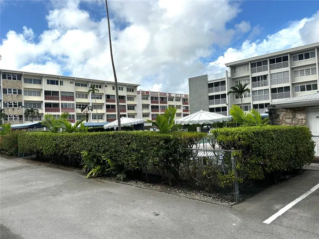 a front view of a building with windows