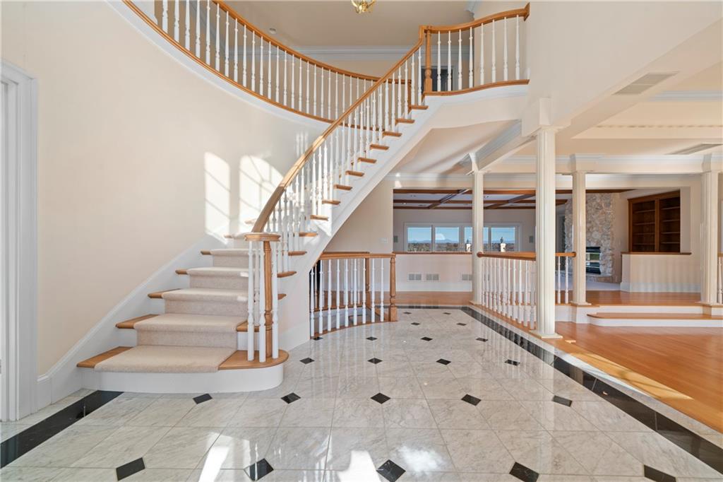 5414 Price Road Gainesville, GA 30506 - Photo 20 of 82 a view of staircase with white walls and windows