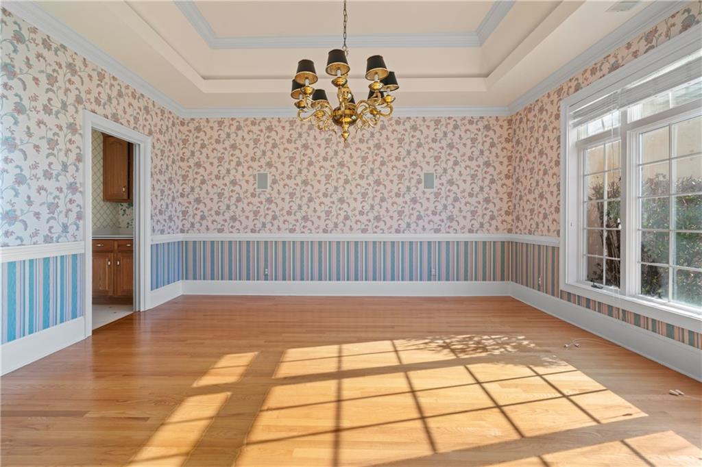 5414 Price Road Gainesville, GA 30506 - Photo 26 of 82 a view of empty room with wooden floor and fan