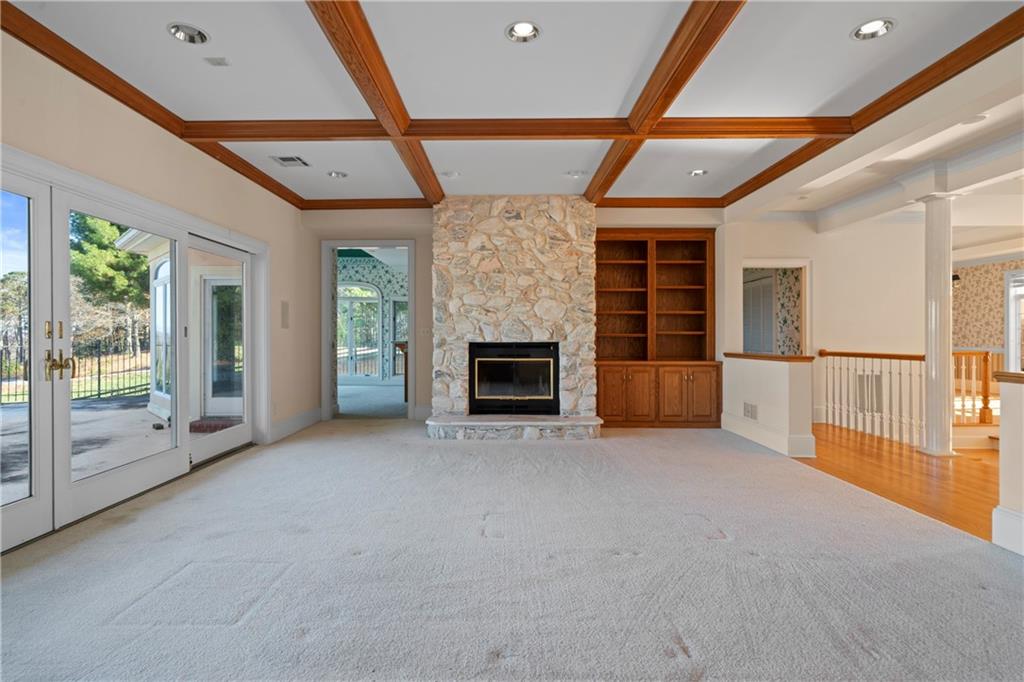5414 Price Road Gainesville, GA 30506 - Photo 38 of 82 a view of an empty room with a fireplace and a window
