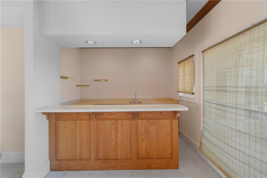 5414 Price Road Gainesville, GA 30506 - Photo 41 of 82 a bathroom with a sink and a mirror