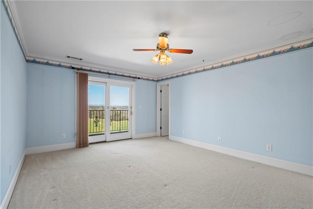 5414 Price Road Gainesville, GA 30506 - Photo 54 of 82 a view of an empty room with a window