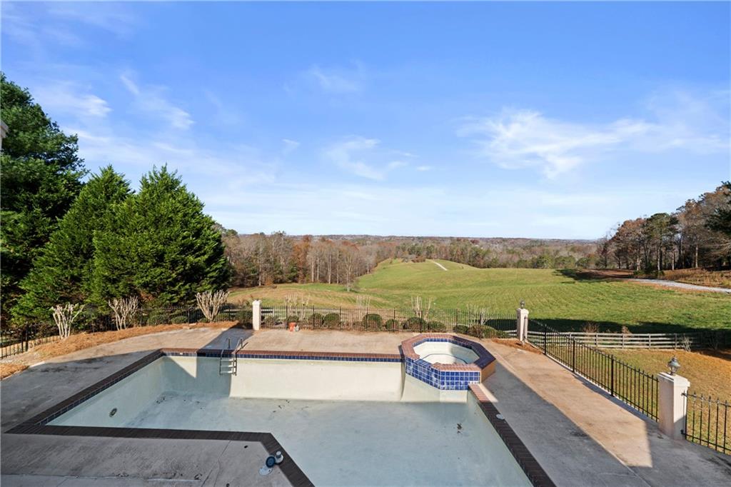 5414 Price Road Gainesville, GA 30506 - Photo 57 of 82 a view of a lake with couches and city view