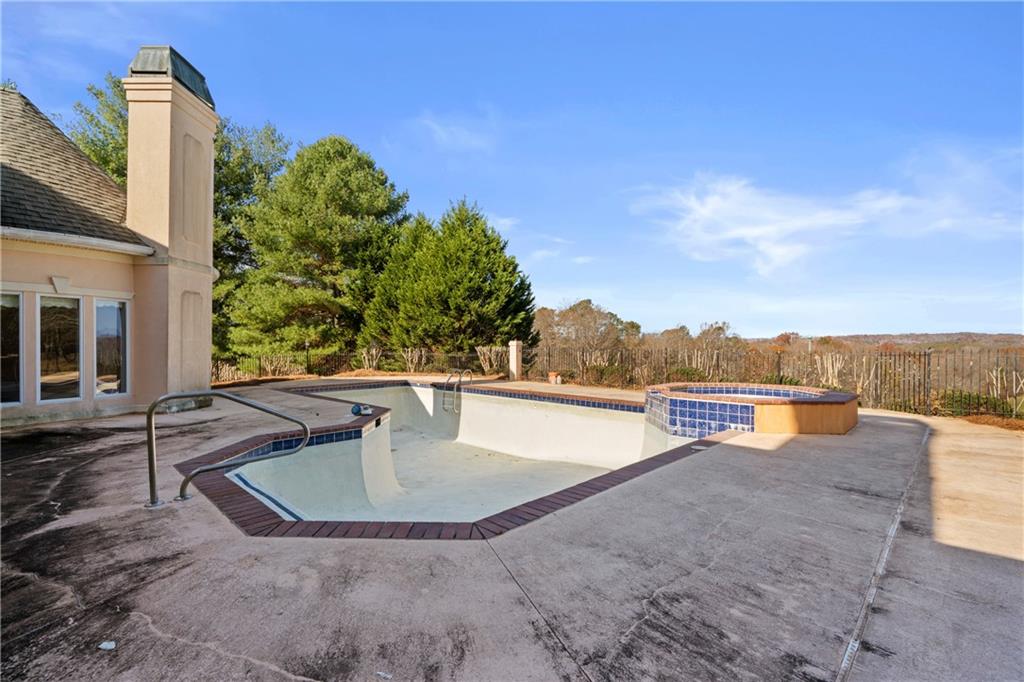 5414 Price Road Gainesville, GA 30506 - Photo 60 of 82 a view of a swimming pool with a yard