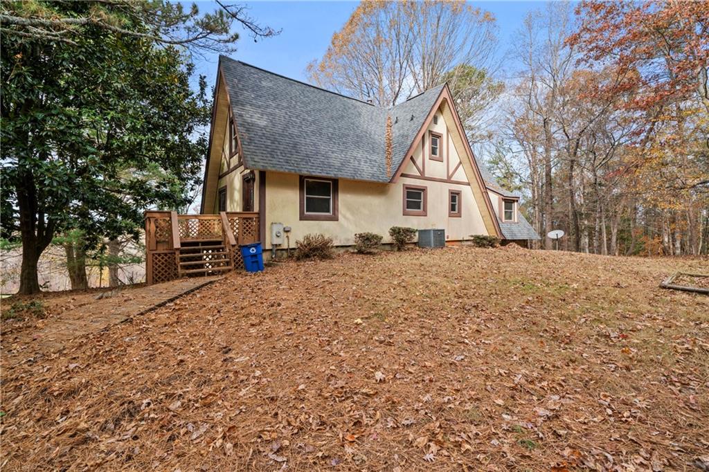5414 Price Road Gainesville, GA 30506 - Photo 64 of 82 a front view of a house with a yard